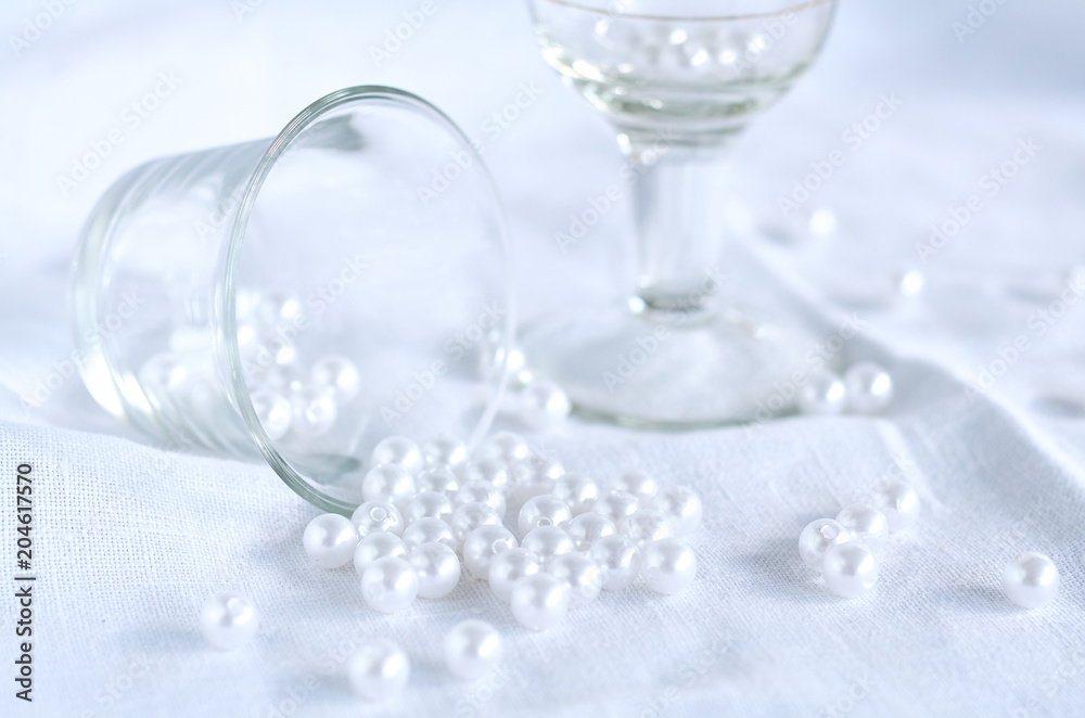 candle, white beads and glass bowl candle, white beads and glass bowl