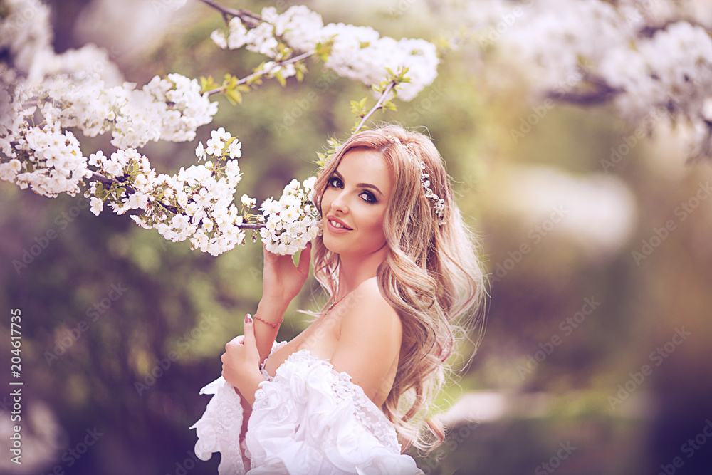 Candid skipping carefree adorable woman in field with flowers at summer sunset. Candid skipping carefree adorable woman in field with flowers at summer sunset.