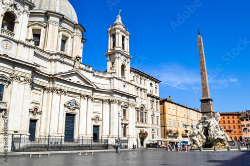 Sant'Agnese in Agone church from Piazza Navona, Rome, Italy, with egyptian obelisk at the right