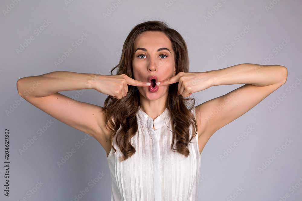 young woman makes herself a massage complex of exercises young woman makes herself a massage complex of exercises