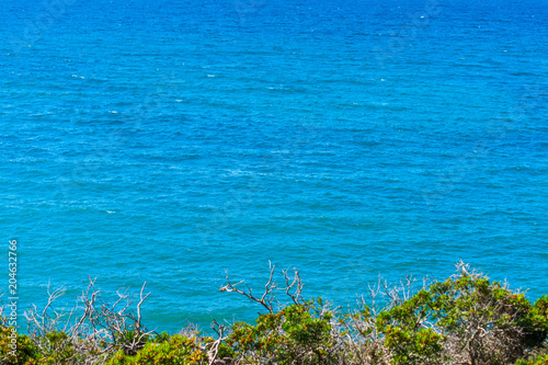 Turquoise water in Alghero coastline