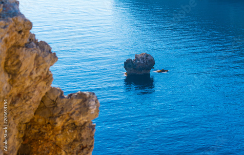 Rocks in the blue sea in Sardinia