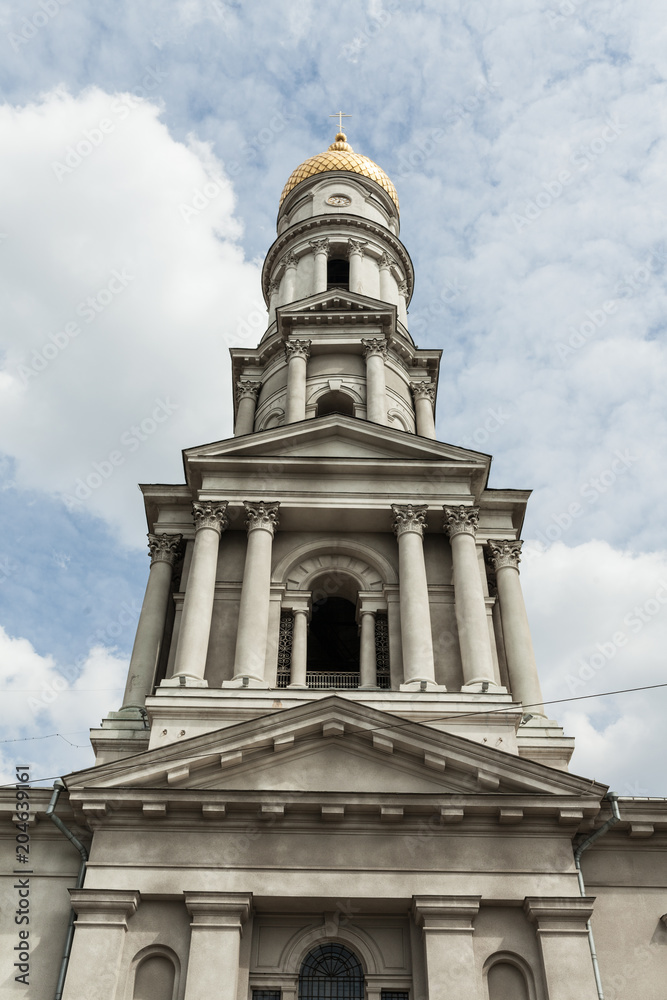 Blue sky with cloud. Yellow dome. Uspenskiy Sobor Located in the Kharkov Ukraine April 2018 Blue sky with cloud. Yellow dome. Uspenskiy Sobor Located in the Kharkov Ukraine April 2018