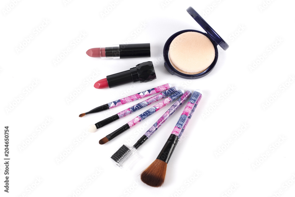 Brush and cosmetic isolated on a white background top view Brush and cosmetic isolated on a white background top view