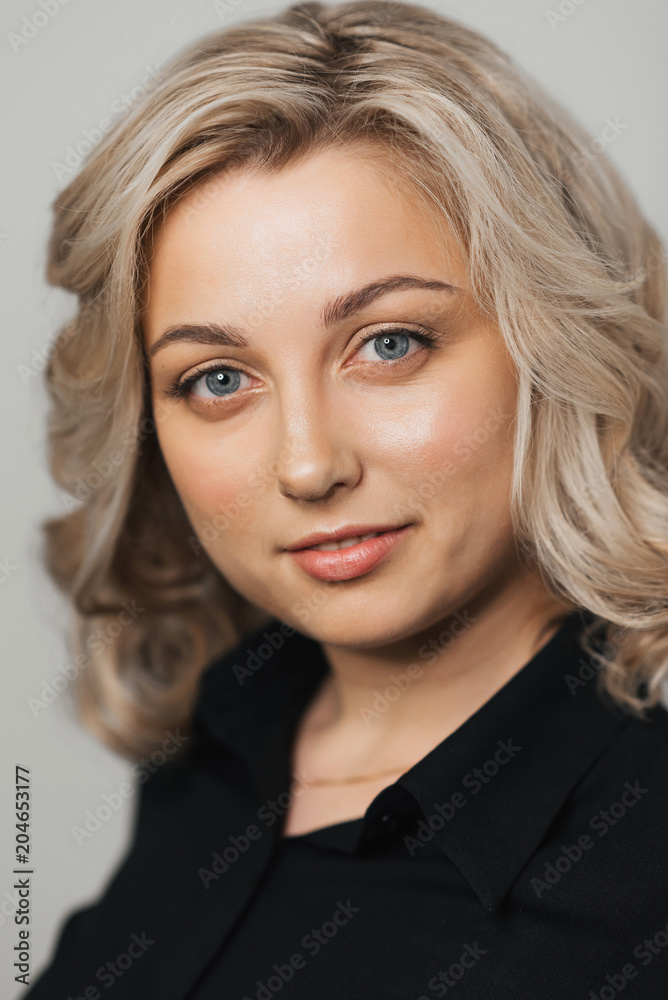 Portrait of young Caucasian blonde girl with Nude makeup with clean skin Portrait of young Caucasian blonde girl with Nude makeup with clean skin