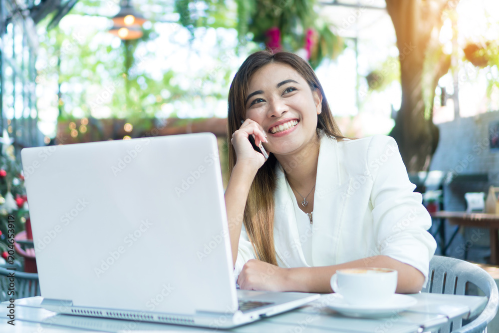 Beautiful girl, she was talking on the phone at breakfast time. She communicated happily. She has a very attractive skin. Beautiful girl, she was talking on the phone at breakfast time. She communicated happily. She has a very attractive skin.