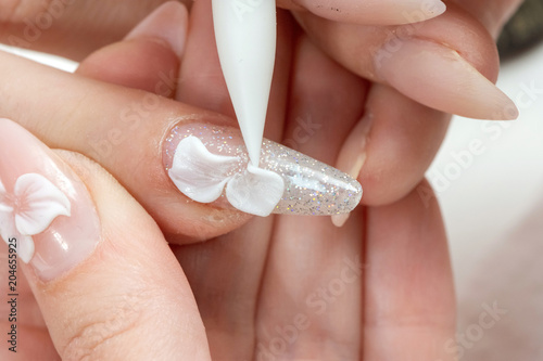 Amazing 3d Flower nail art design on tinted glass nails.