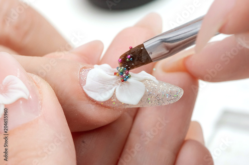 Amazing 3d Flower nail art design on tinted glass nails.