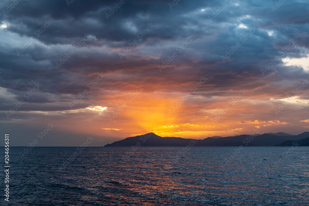 Sunset during a navigation to Portofino