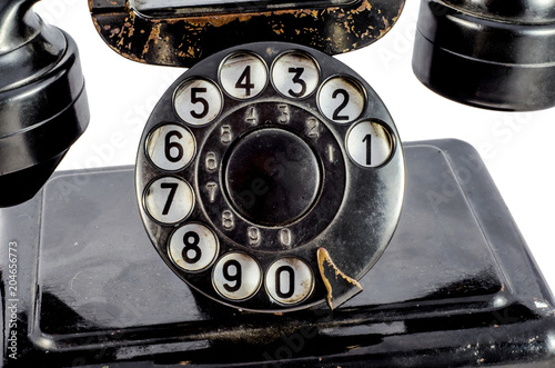Canvas Print Disk dialer of old vintage black phone close-up
