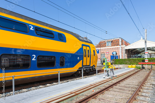 Intercity train at railway station of Enkhuizen in The Netherlands