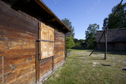 Old wooden traditional house in heritage park of Kampinos Forest in Poland