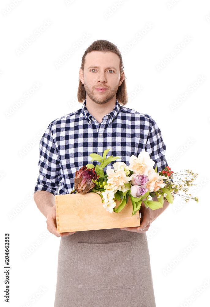Male florist holding basket with flowers on white background Male florist holding basket with flowers on white background