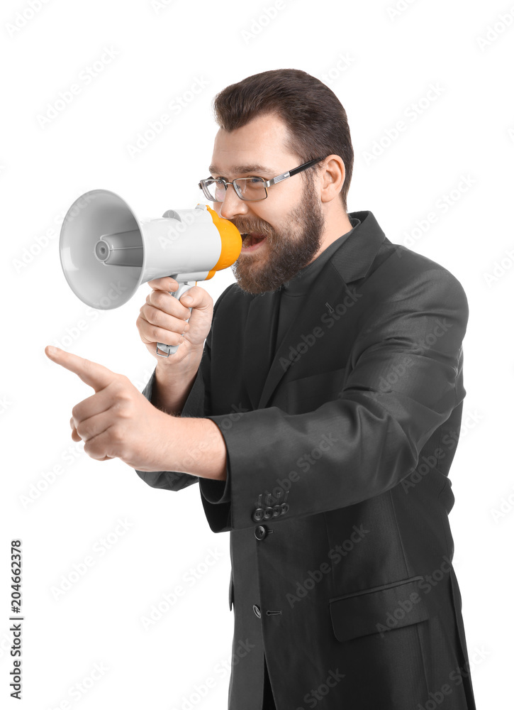 Young businessman shouting into megaphone on white background Young businessman shouting into megaphone on white background