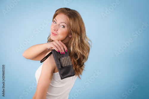 Elegant woman holding hand purse wallet
