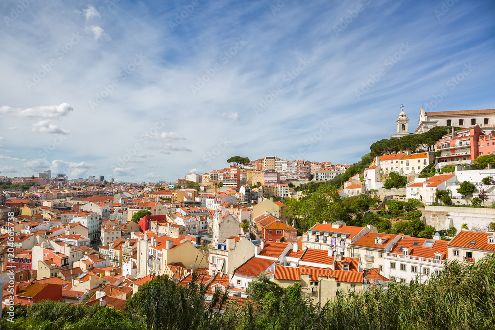 Panorama of the old town in Lisbon at sunny spring day,  Portugal.  On the hill   