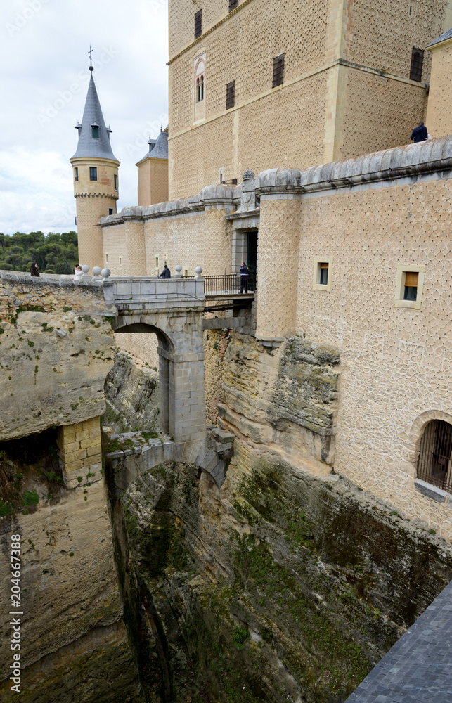 View of Alcazar de Segovia castle in a cloudy day
