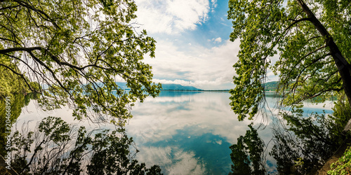 Beautiful Nature Scene Lake with trees touching the water © Lambros Kazan