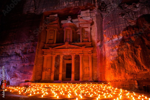 The Treasury (Al Khazneh) of Petra Ancient City over the night, Jordan.