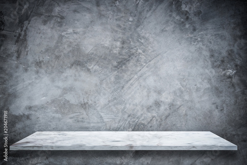 Empty top marble shelves with stone wall background. Mock up scene for display or montage of product on soft focus blur background. 