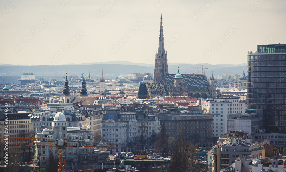 Beautiful super-wide angle aerial view of Vienna, Austria, with old town Historic Center and scenery beyond the city, shot from ferris wheel in Prater Park