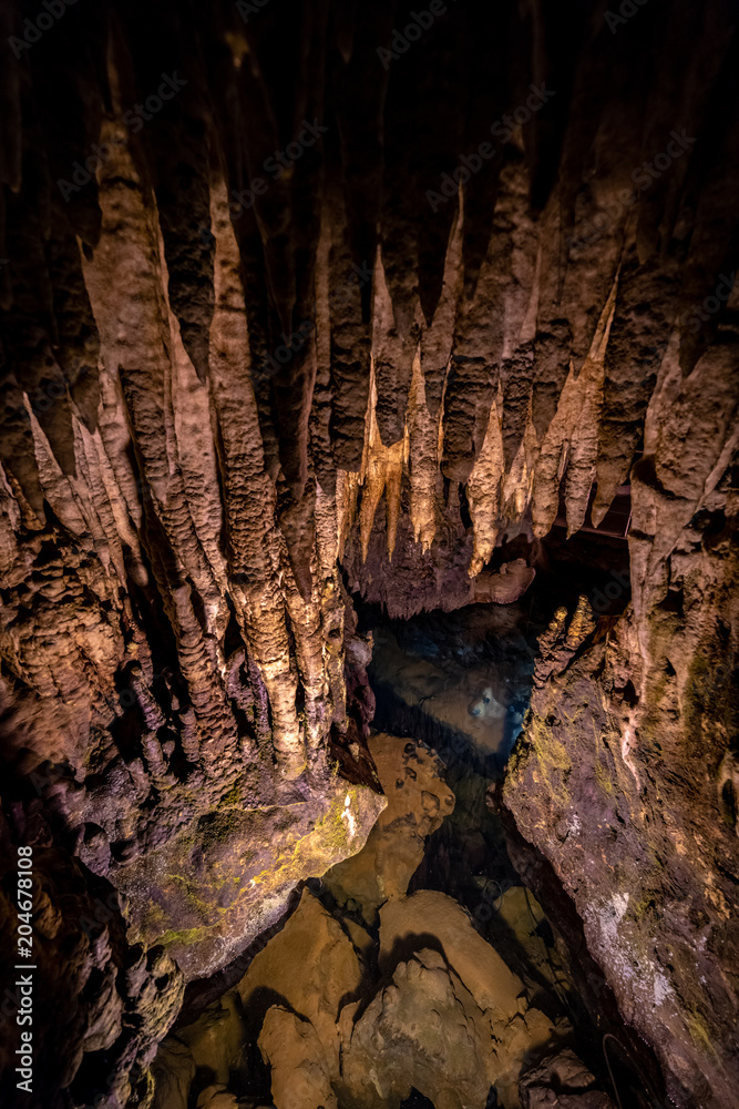 Millions Years Old mineral formation on a cave ceiling known as Stalactites Millions Years Old mineral formation on a cave ceiling known as Stalactites