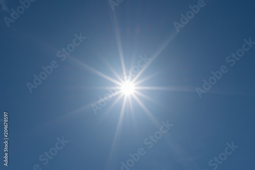 Sun and blue sky background