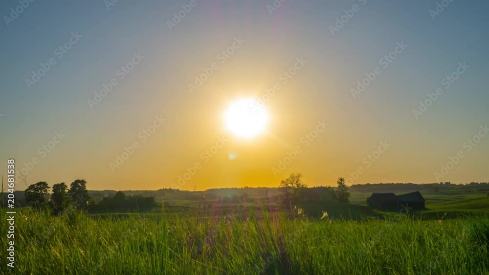 Sunset and rural landscape, time-lapse with crane