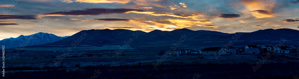 Long panorama of house contruction at sunset or sunrise