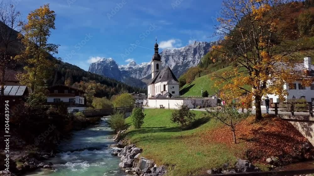 Flight over famous Parish church St. Sebastian, in Ramsau, Berchtesgaden, Bavarian Alps Germany. Flight over famous Parish church St. Sebastian, in Ramsau, Berchtesgaden, Bavarian Alps Germany.
