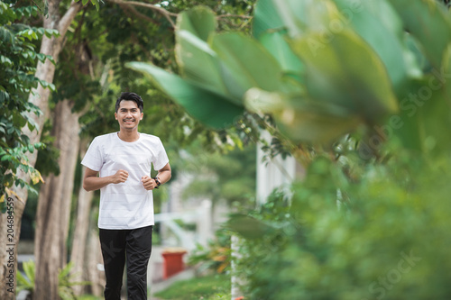 asian man running and exercising outdoor