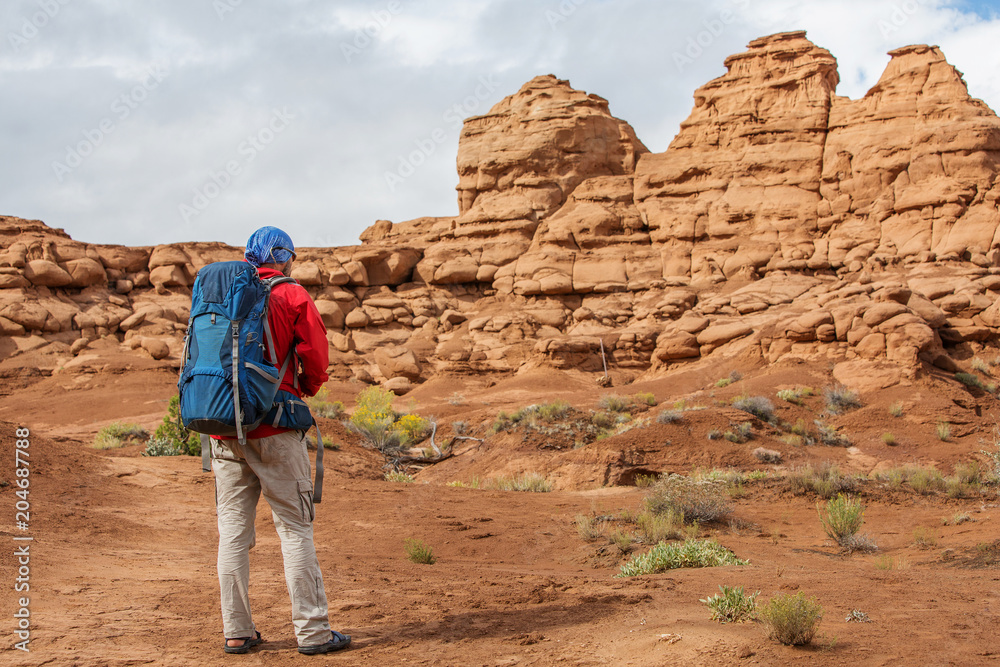Hiker in Kodachrome Basin state park in Utah, USA Hiker in Kodachrome Basin state park in Utah, USA