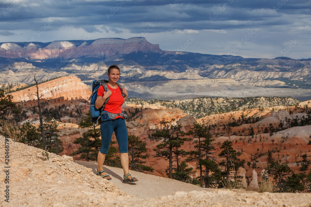 Fototapeta premium Hiker visits Bryce canyon National park in Utah, USA
