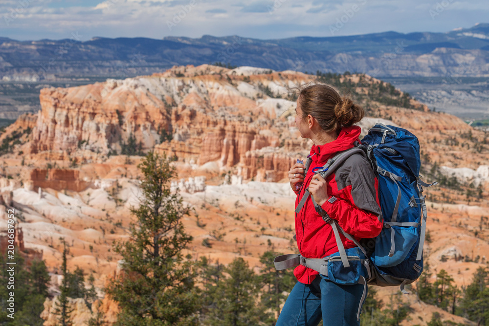 Naklejka premium Hiker visits Bryce canyon National park in Utah, USA