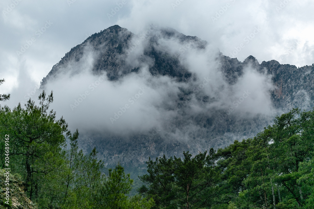 Mountain peak in the clouds