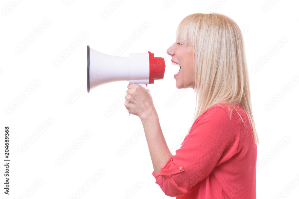 Young blond woman shouting into a megaphone Young blond woman shouting into a megaphone