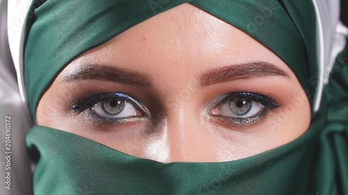 Beautiful Woman in Middle Eastern Niqab veil. photo