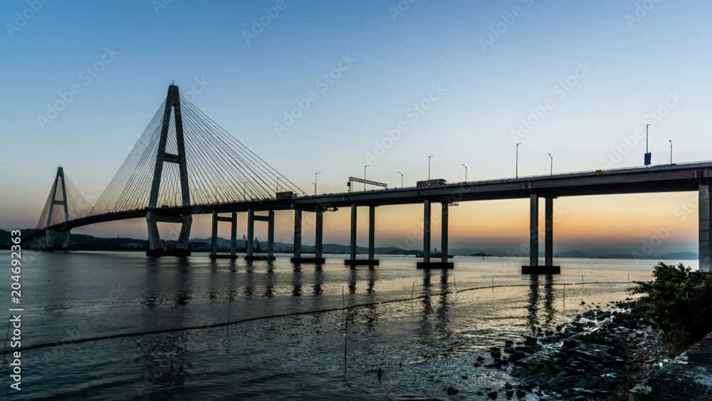 From sunset to night, the splendid view of Shantou birdge, Shantou, China From sunset to night, the splendid view of Shantou birdge, Shantou, China