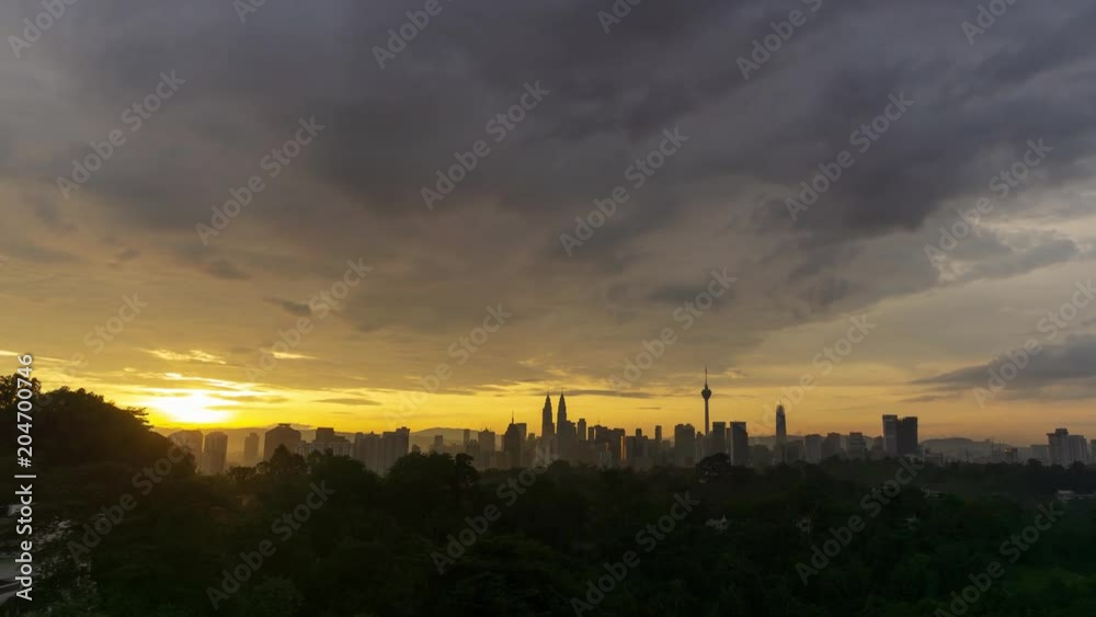 4K Time lapse of majestic sunrise over downtown Kuala Lumpur, Malaysia. Zoom In. 4K Time lapse of majestic sunrise over downtown Kuala Lumpur, Malaysia. Zoom In.