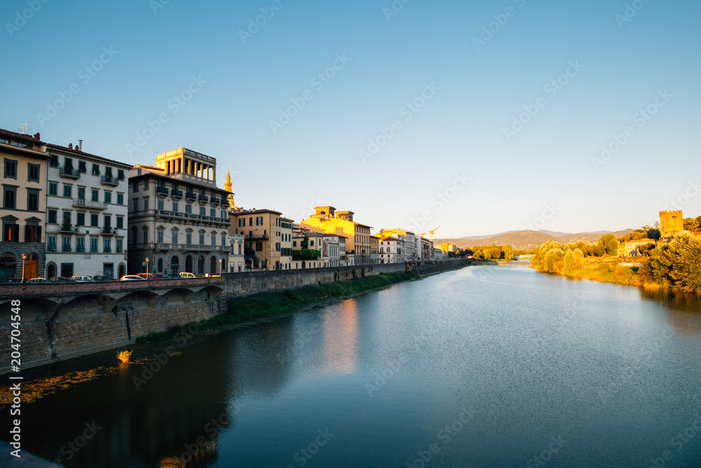 European buildings and Arno river in Florence, Italy