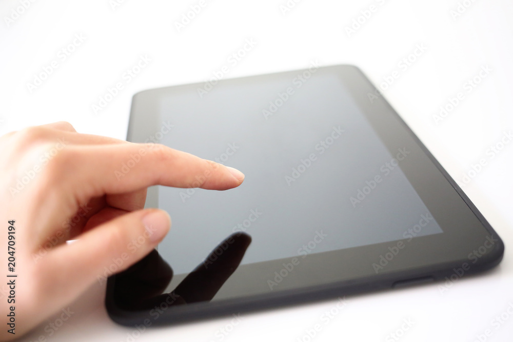 Hands using a digital smart tablet pc Hands using a digital smart tablet pc