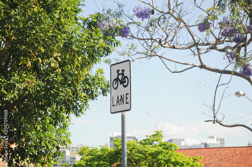 Bike lane sign on a pole