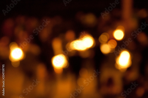 Defocused abstract festive orange light background