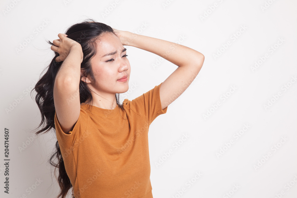 Stressed young Asian businesswoman scream out. Stressed young Asian businesswoman scream out.