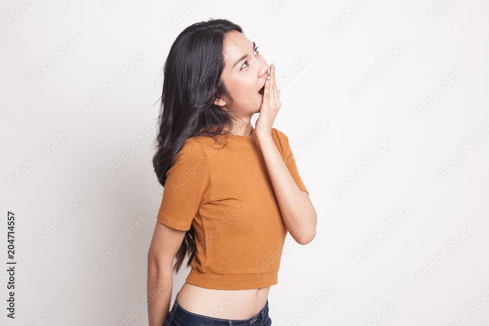 Sleepy young Asian woman yawn. Sleepy young Asian woman yawn.