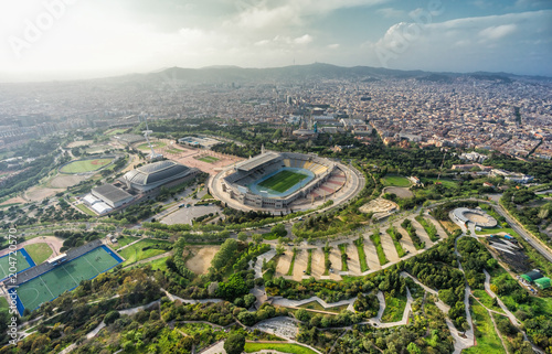 Barcelona aerial city panorama, sport complex on the hill with city skyline , Spain