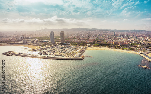 Photography Barcelona skyline aerial view with skyscrapers by the beach, Spain