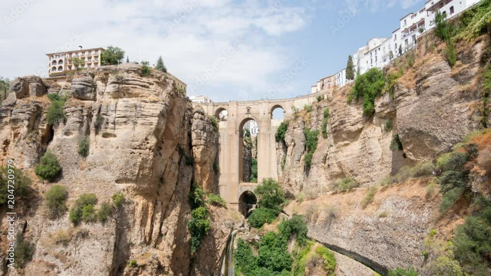 Beautiful timelapse view of Puente Nuevo bridge over Tajo Gorge in Ronda, Andalusia, Spain Beautiful timelapse view of Puente Nuevo bridge over Tajo Gorge in Ronda, Andalusia, Spain