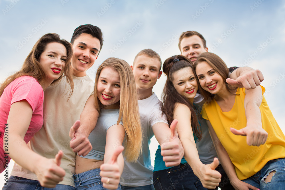 Group of happy young people laughing Group of happy young people laughing