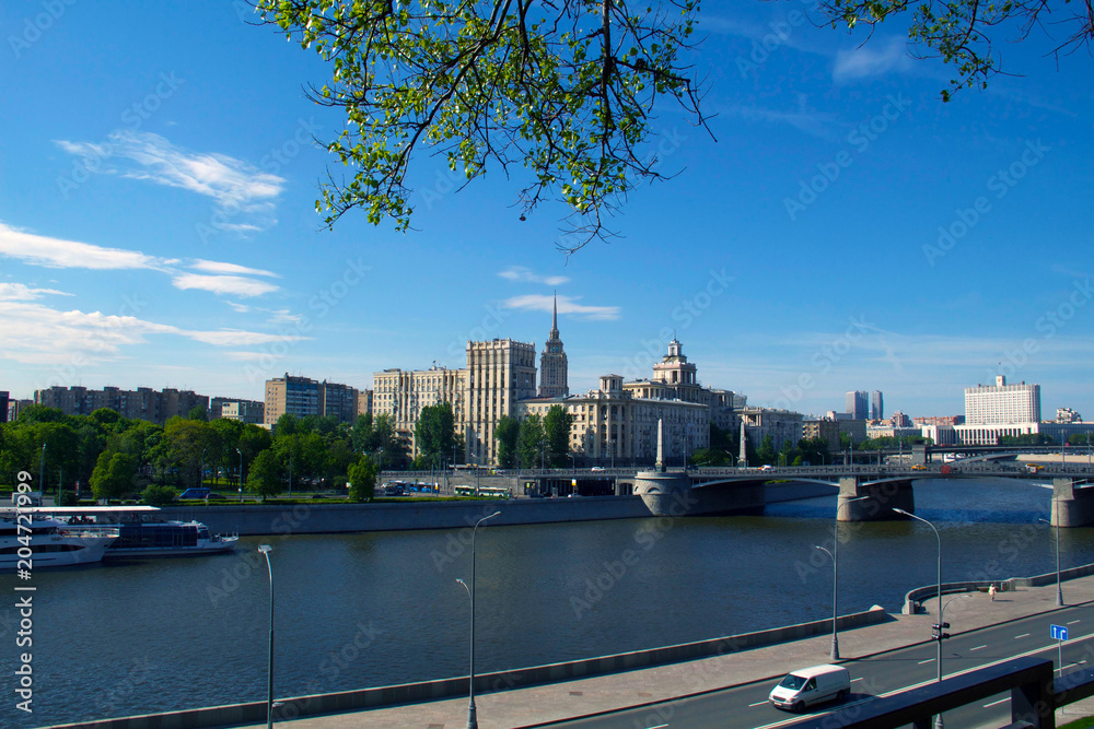 Moscow / Russia - 05 11 18: View on the Borodinsky Bridge, the Russian White House (Government building) and the Moscow (Moskva) River from Rostovskaya embankment.  